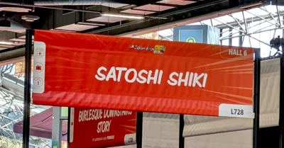 Bannière du stand de Satoshi Shiki